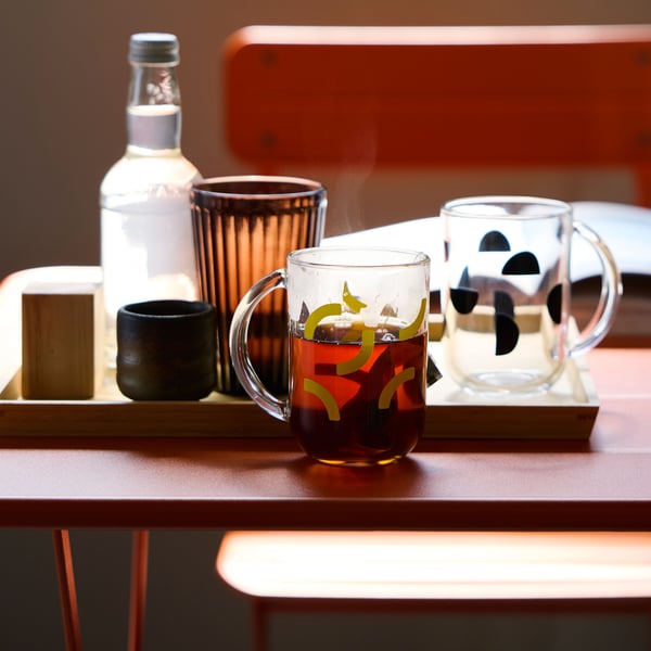 A brown VARDAGEN glass.