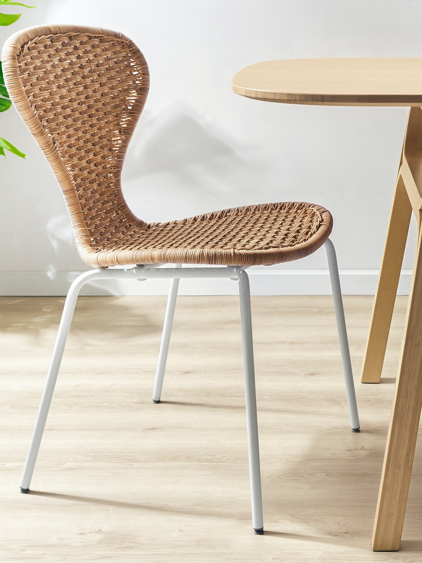 A handmade rattan/SEFAST white ÄLVSTA chair