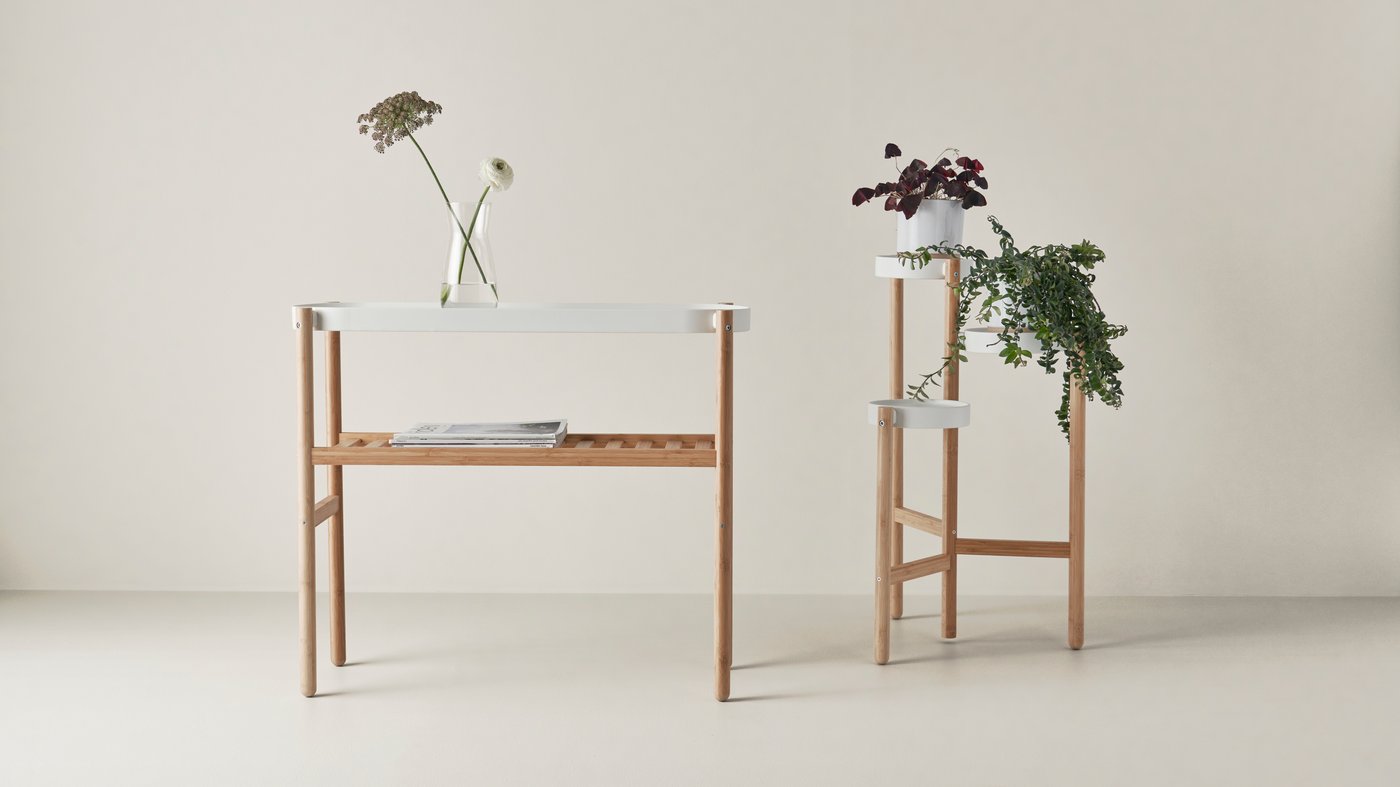 A bamboo/white SATSUMAS plant stand