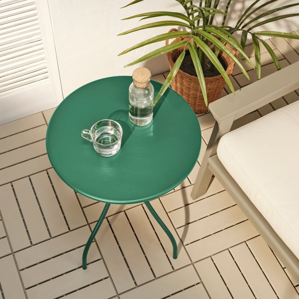 An in/outdoor/dark green TÅNEBRO side table