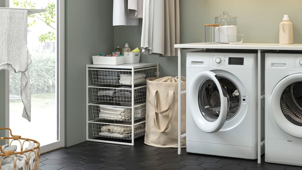 JONAXEL storage combination on the corner of the laundry room.