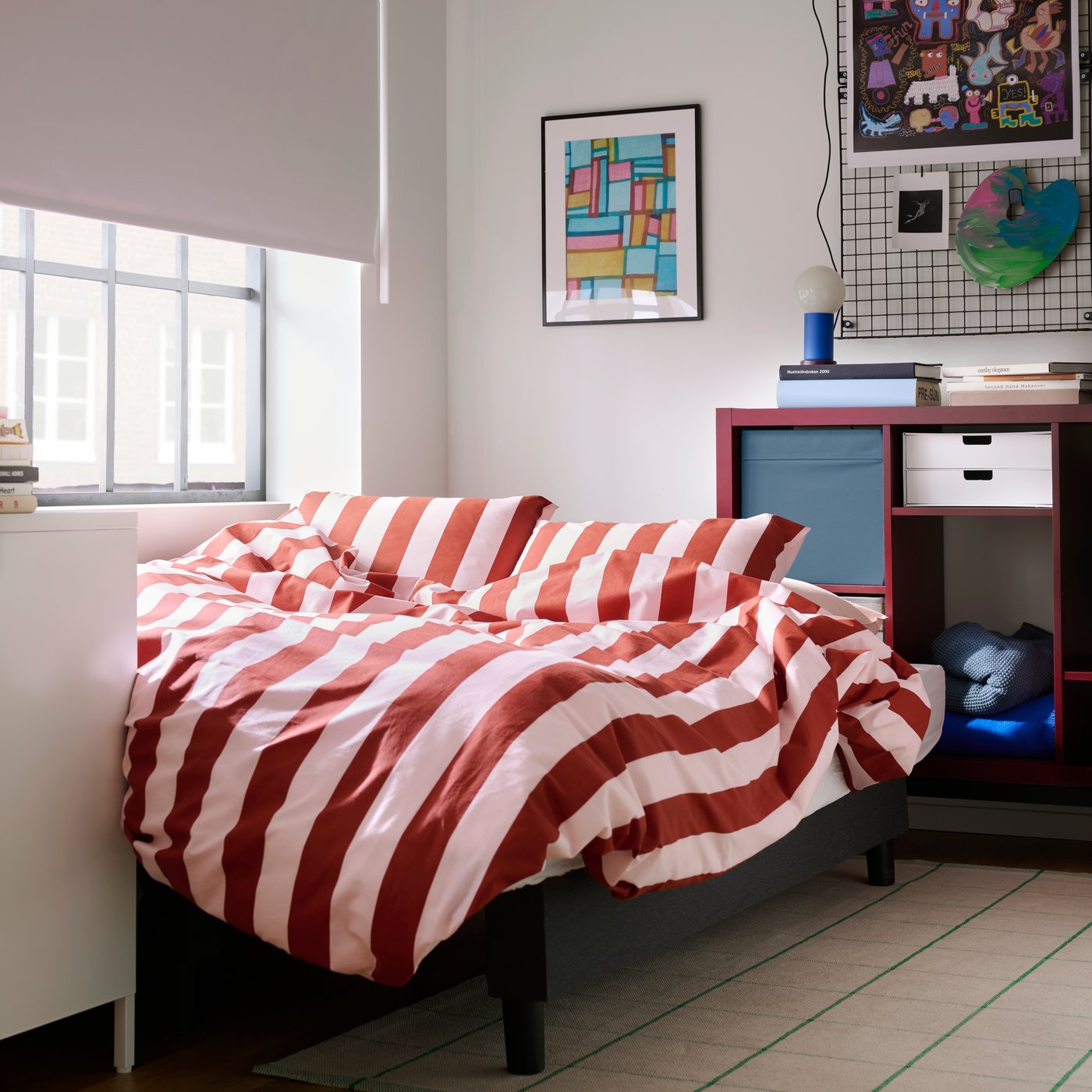 A white FJÄDERHARV mini chest with 2 drawers in the bedroom