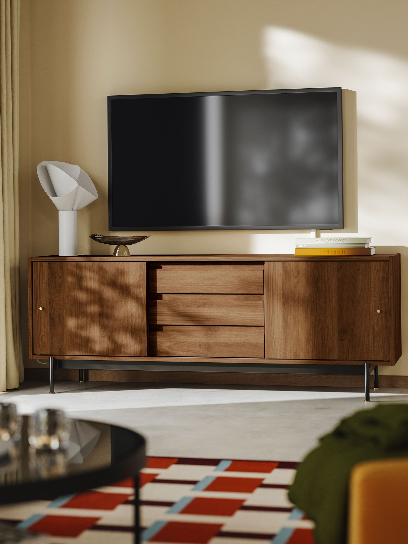 A brown walnut effect RÅDMANSÖ TV bench