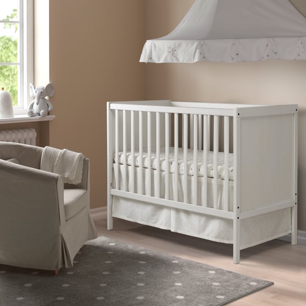 A white SUNDVIK cot