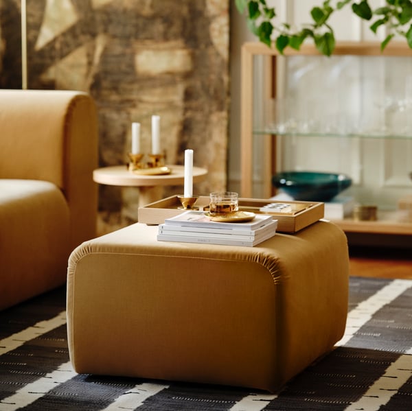 A dark blue-turquoise STOCKHOLM 2025 bowl in the living room