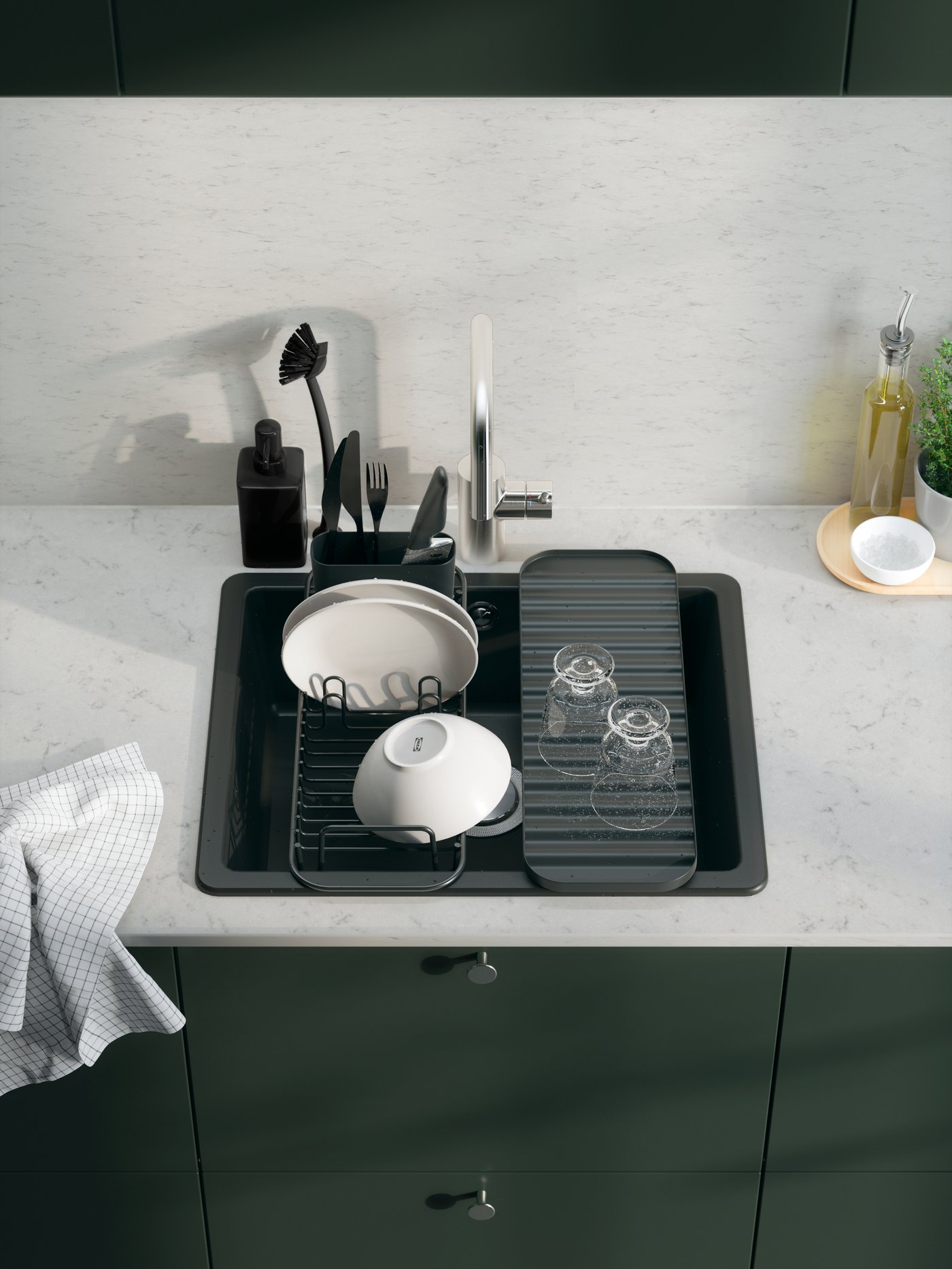 A stainless steel colour ÄLMAREN kitchen mixer tap in the kitchen
