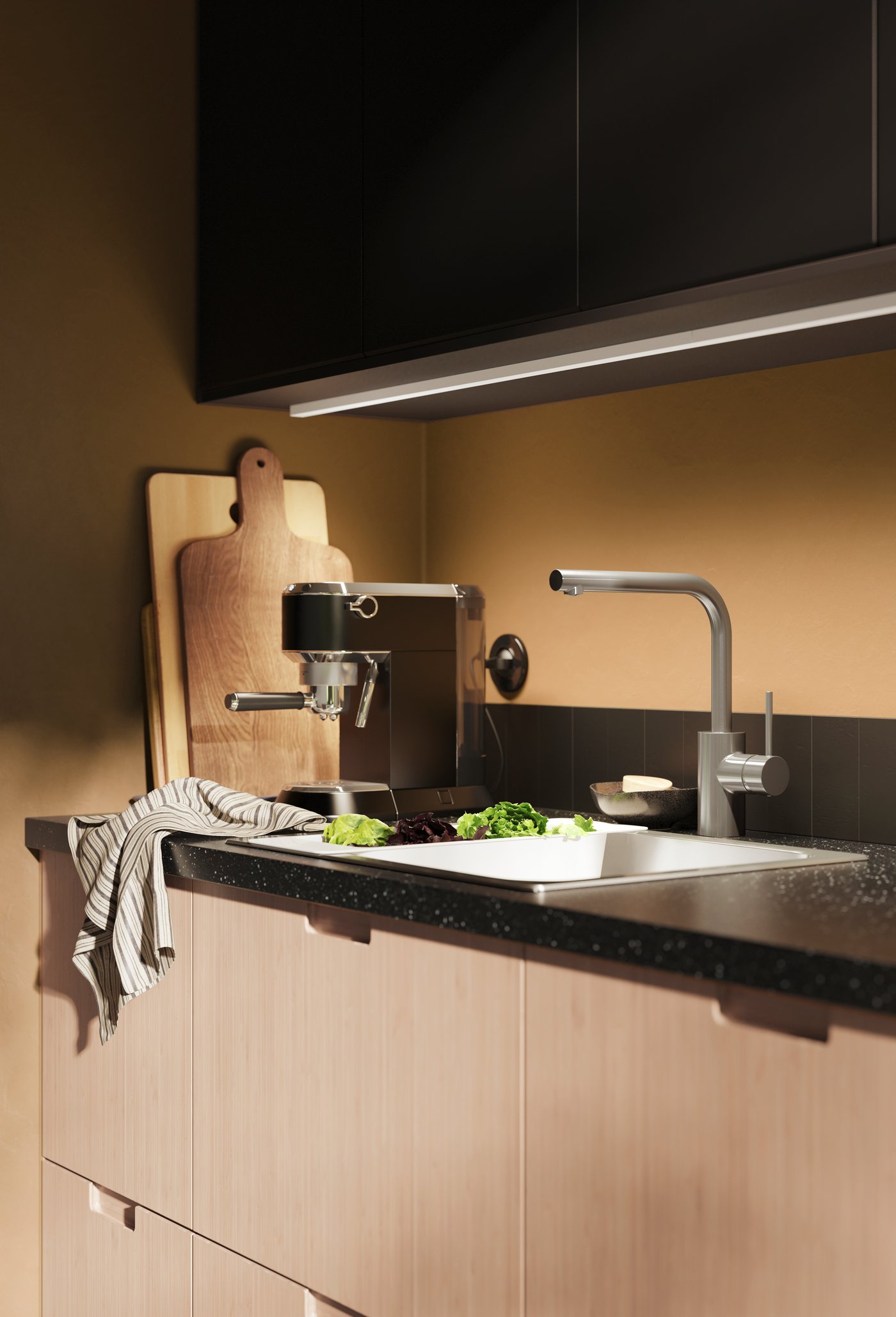 A white/dark grey/patterned RINNIG tea towel in the kitchen