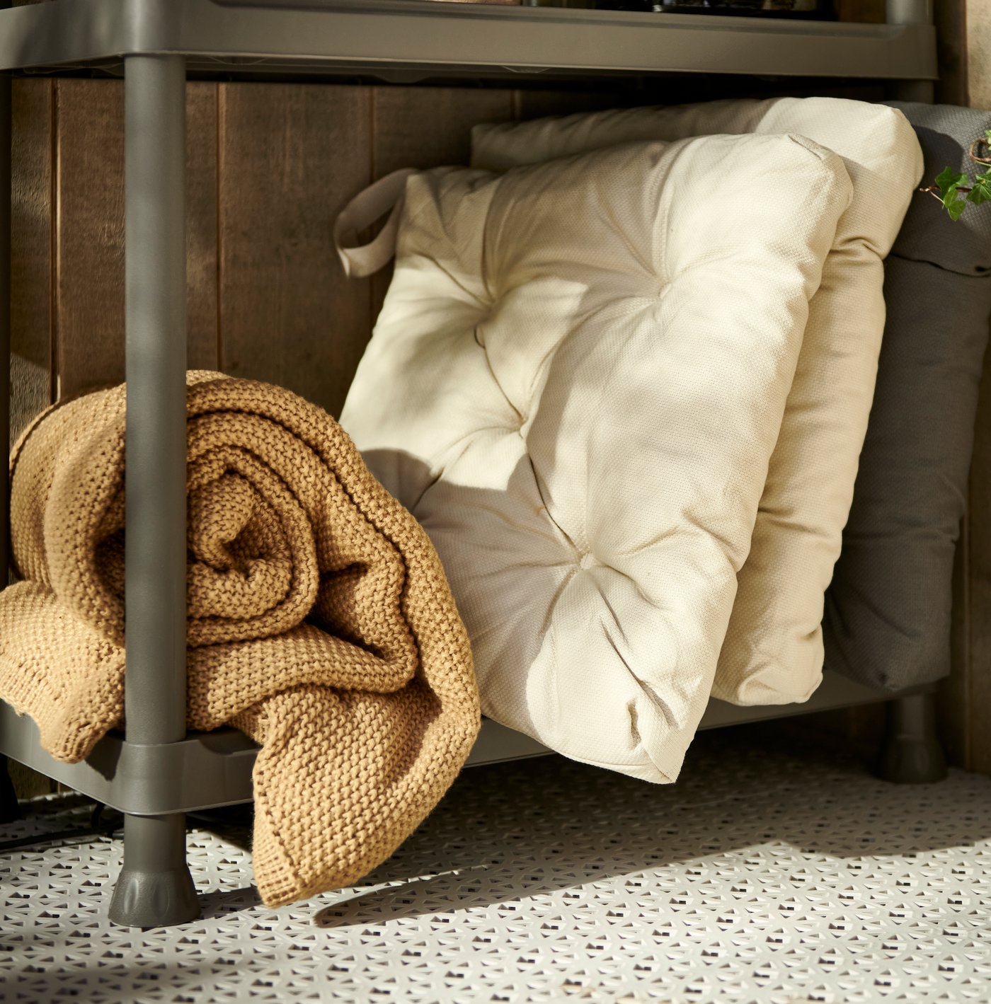 A light beige MALINDA chair cushion