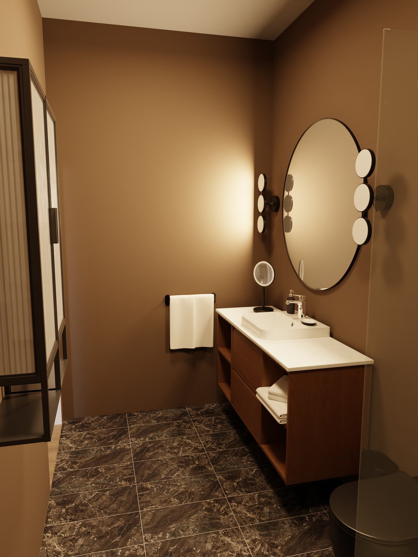 Badezimmer mit großem runden Spiegel und Wandleuchten sowei ei nem Waschtisch aus dunkler Eiche.