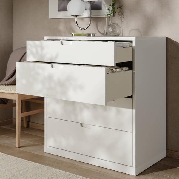 An off-white/anchor/unlock-function TONSTAD chest of 4 drawers