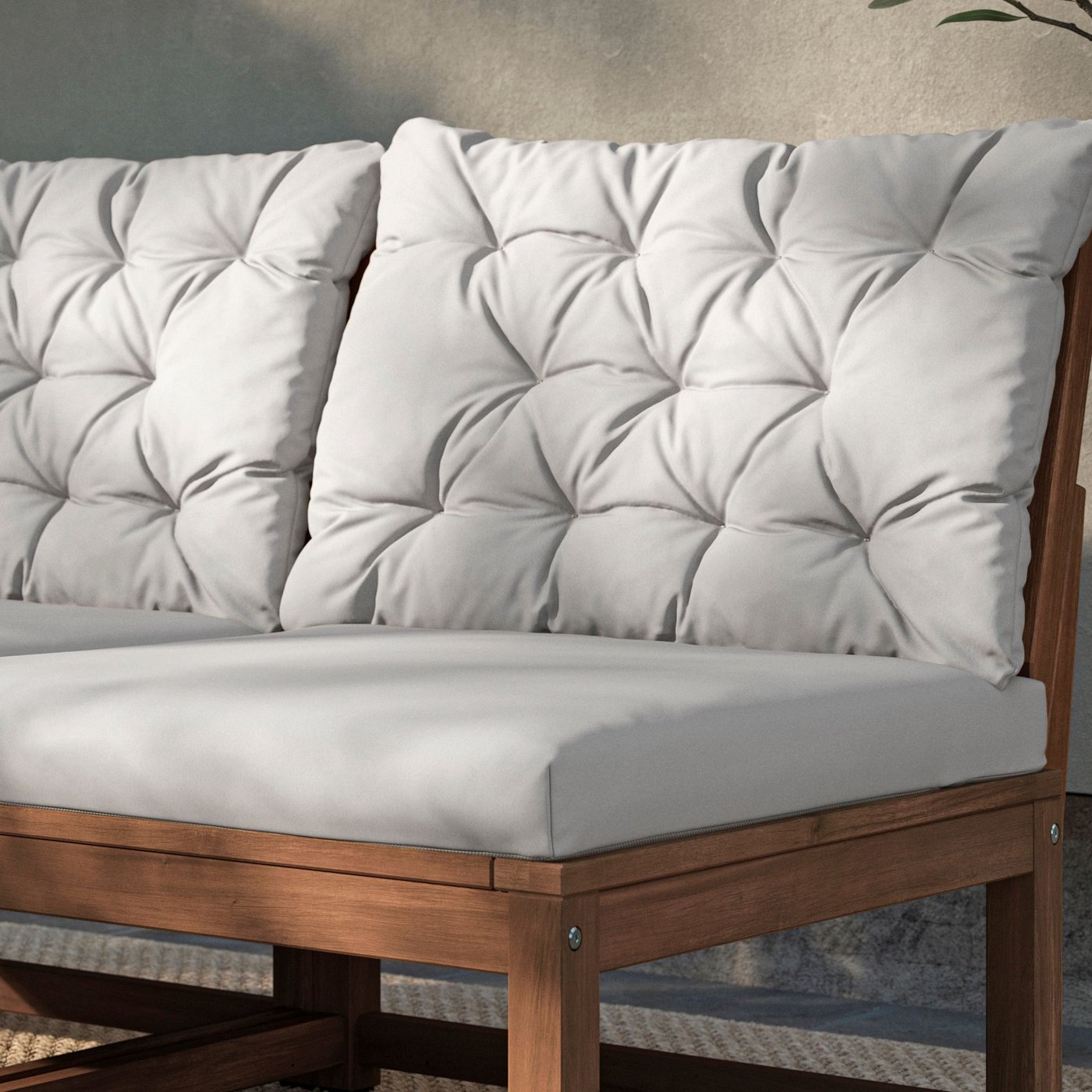 A light grey-beige KUDDARNA back cushion, outdoor