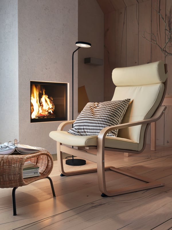 A rattan/anthracite GAMLEHULT footstool with storage in the living room