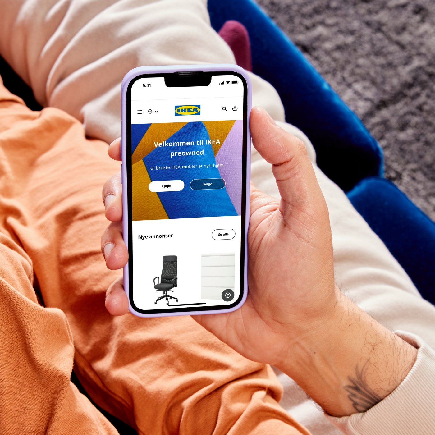 mobile in one hand with IKEA Preowned