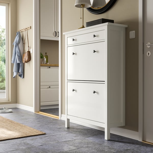 A white HEMNES shoe cabinet with 2 compartments