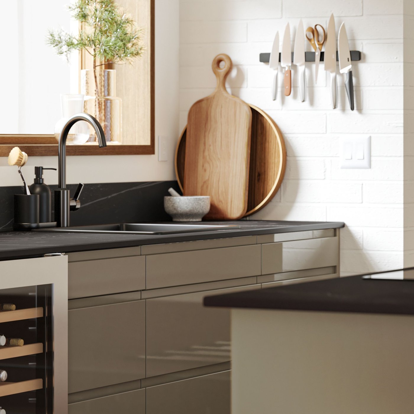 A kitchen with MÖCKLARP custom-made worktop in matt black/brown on a kitchen island, in front of a sink with kitchen items.