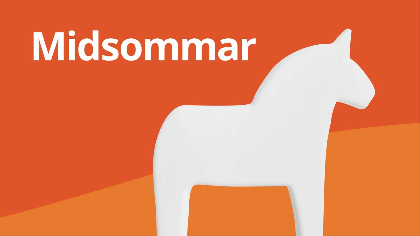 Wooden Dala horse ornament on an orange background