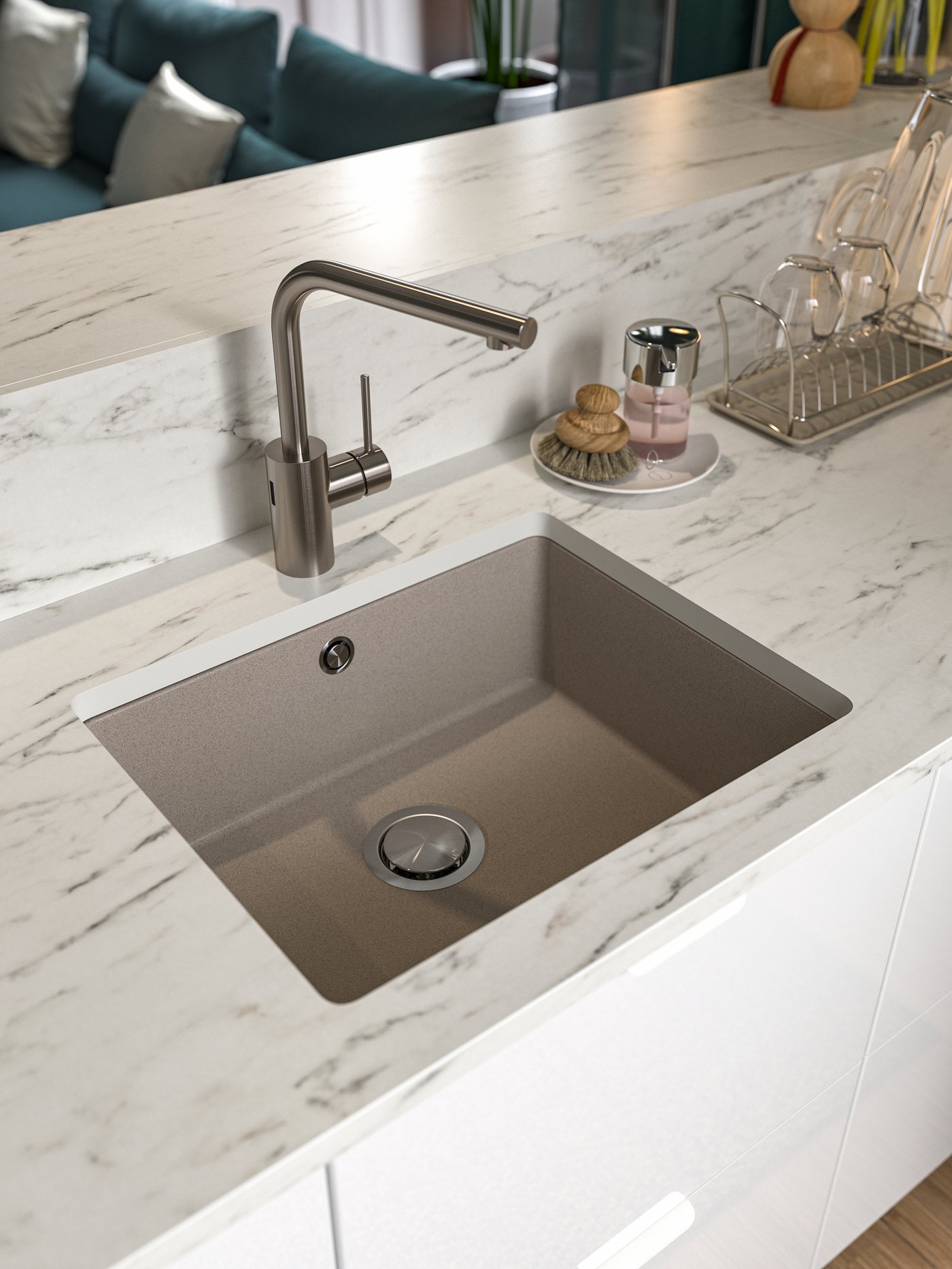 A clear glass STORSINT glass next to a kitchen sink