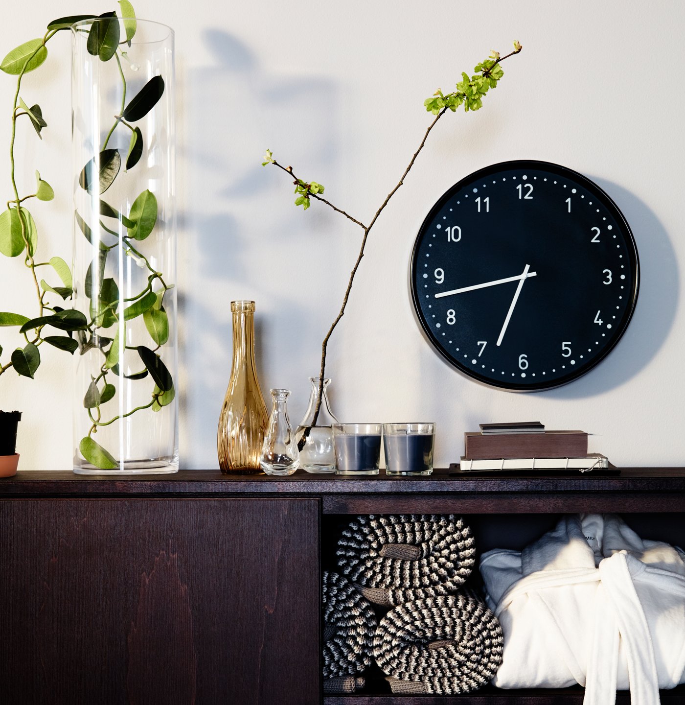 An assorted patterns/assorted colours LOVLIG vase, BONDIS black wall clock.