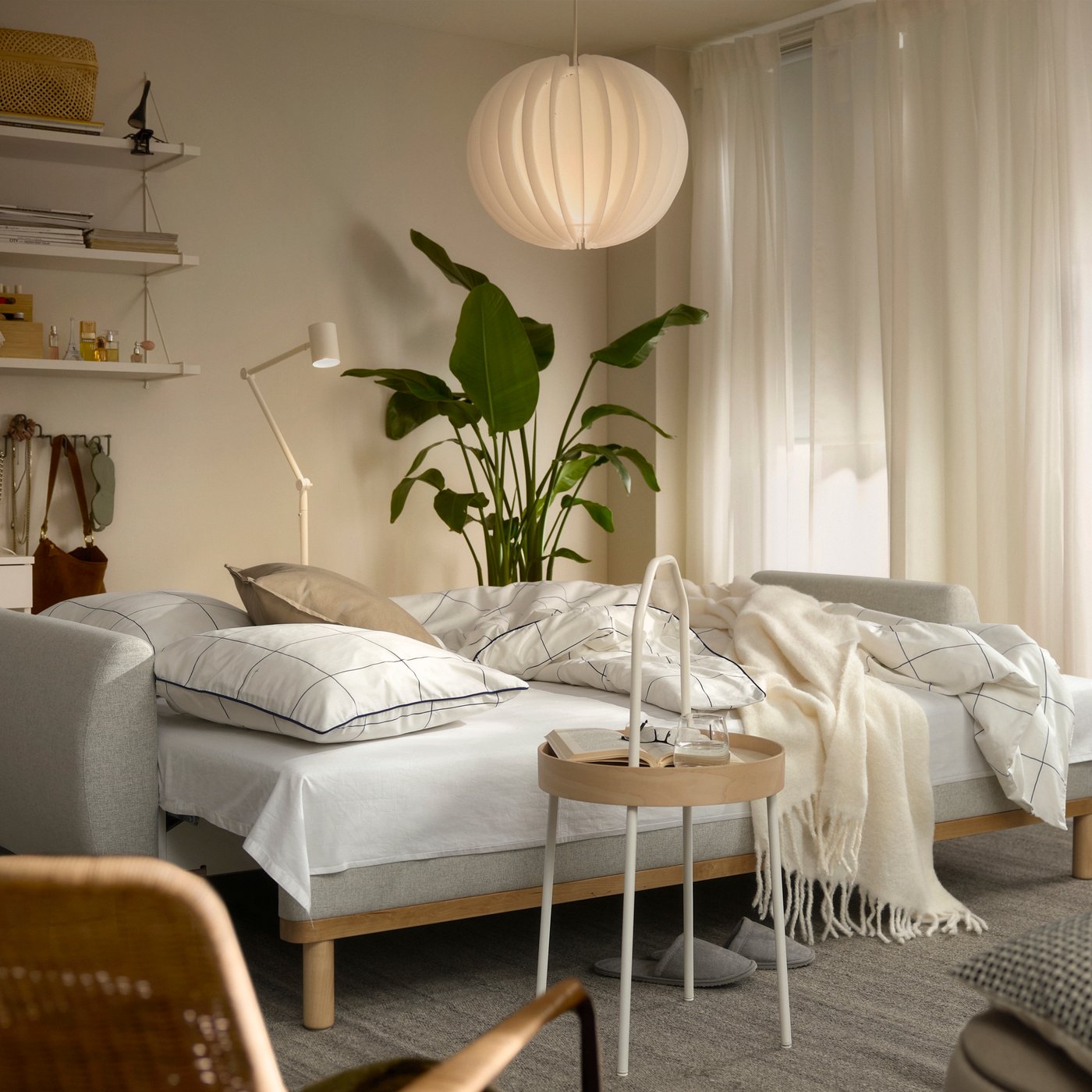 A Gunnared beige GRUNNARP 3-seat sofa-bed