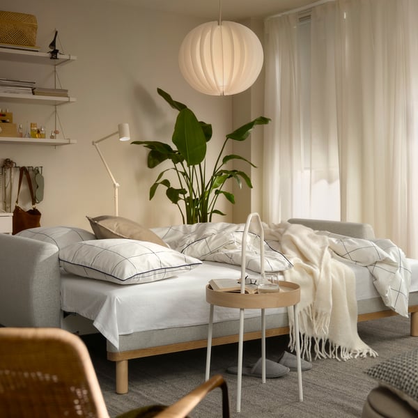 A Gunnared beige GRUNNARP 3-seat sofa-bed