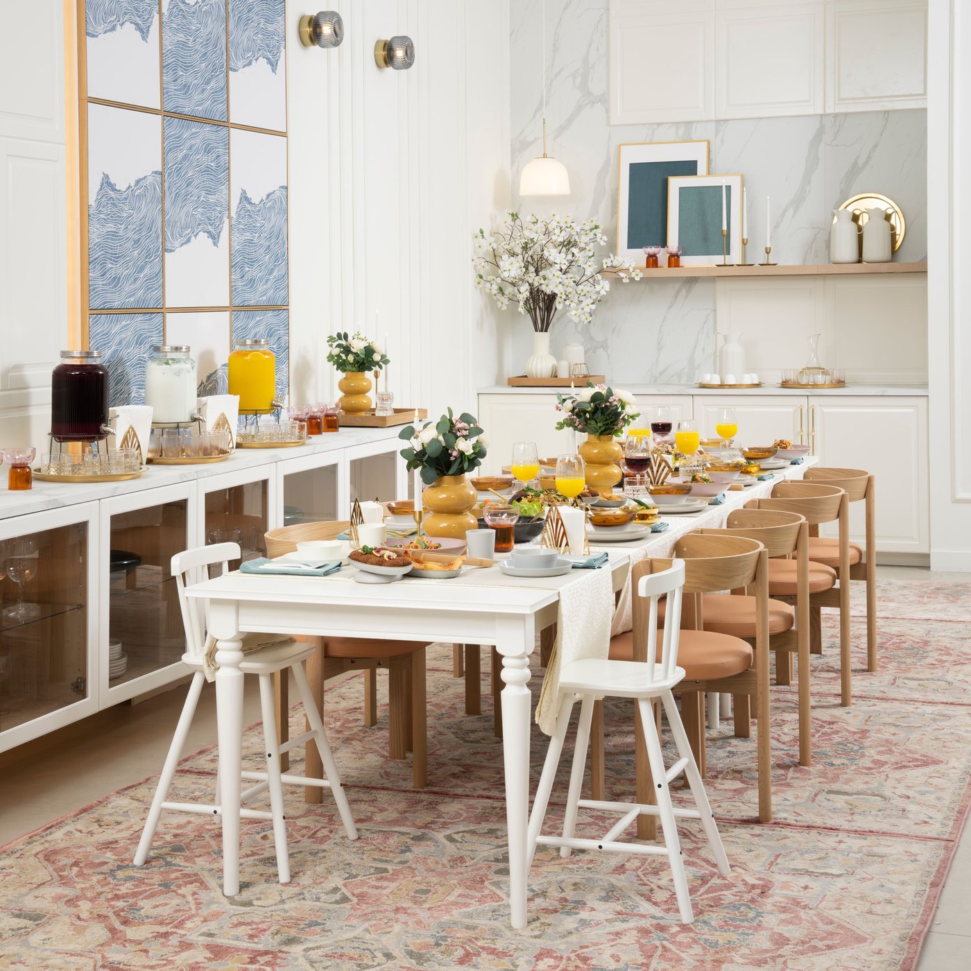 A white ROSENTORP extendable table in the dining room
