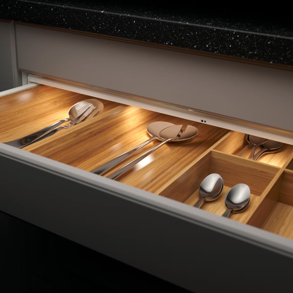 Perfect drawer lighting in a kitchen drawer with cutlery and wooden dividers