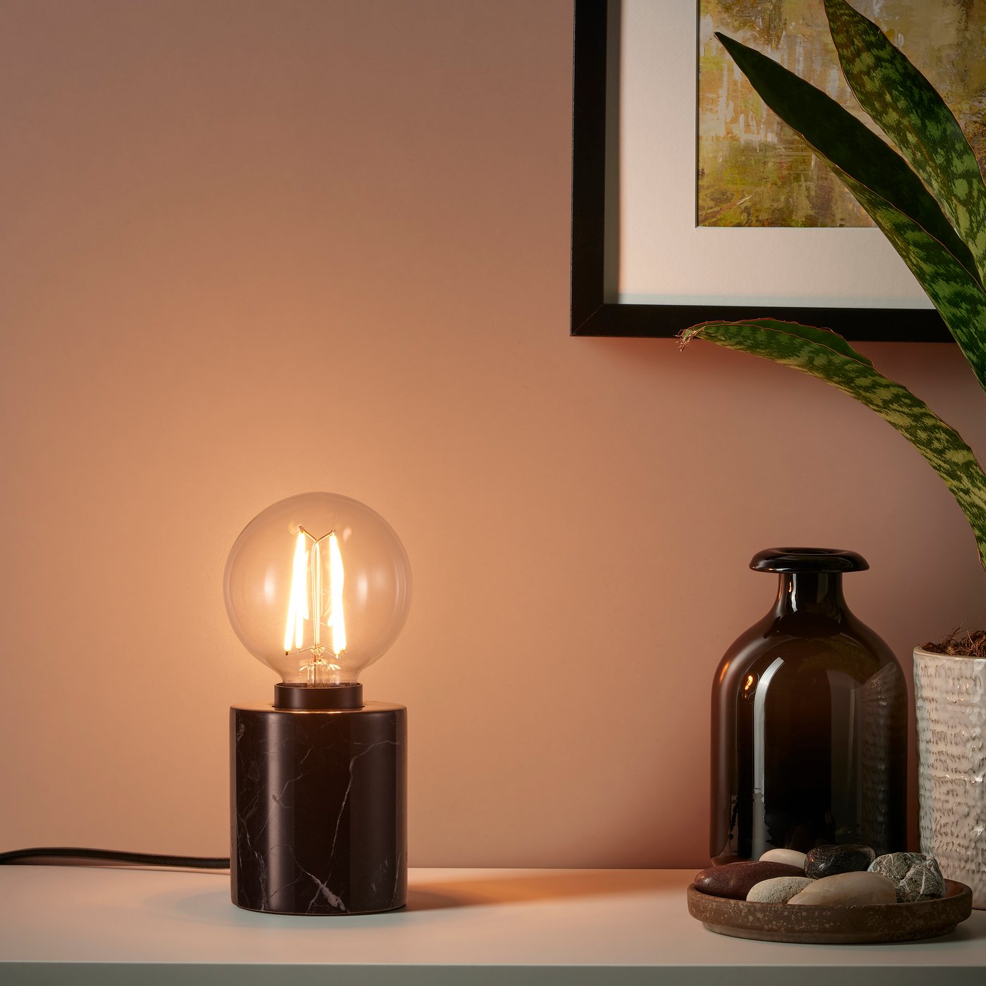 A globe clear SOLHETTA LED bulb E27 1055 lumen