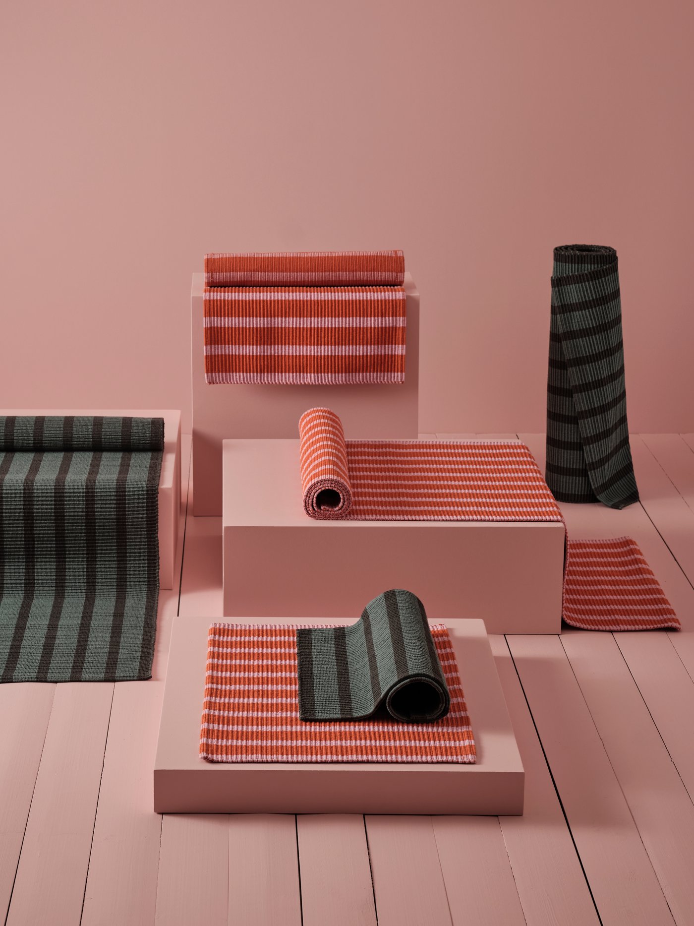 A blue-green/black VÄGSKYLT rug, flatwoven