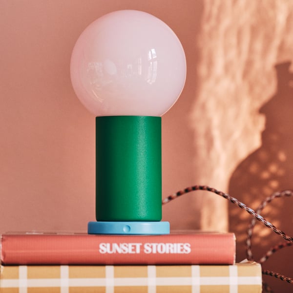 A battery-operated dimmable/green light pink IKEA PS 2026 LED portable lamp in the NA