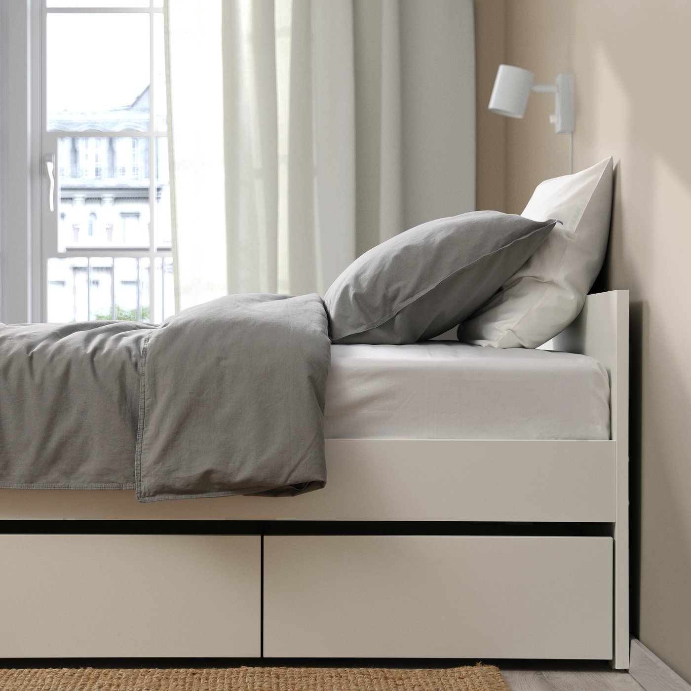 A white/Luröy VIHALS bed frame with 2 storage boxes