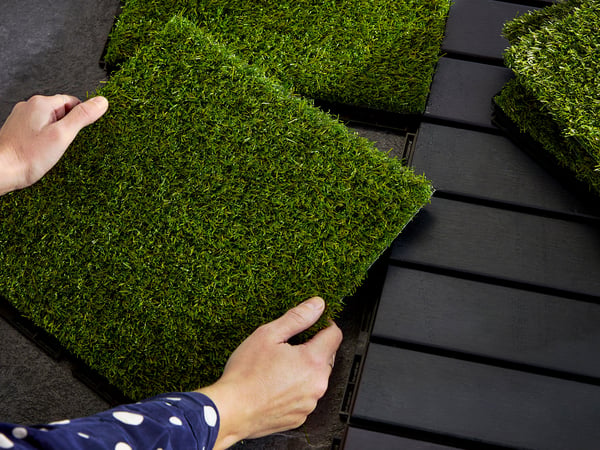 A dark grey RUNNEN floor decking, outdoor outside