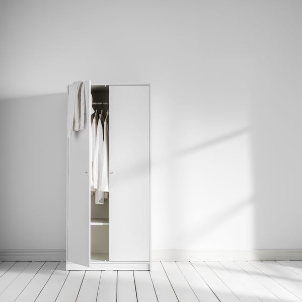 A white KLEPPSTAD wardrobe with 2 doors in the bedroom