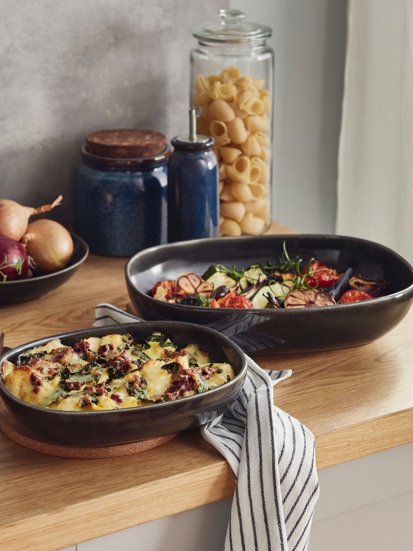 A clear glass VARDAGEN jar with lid.