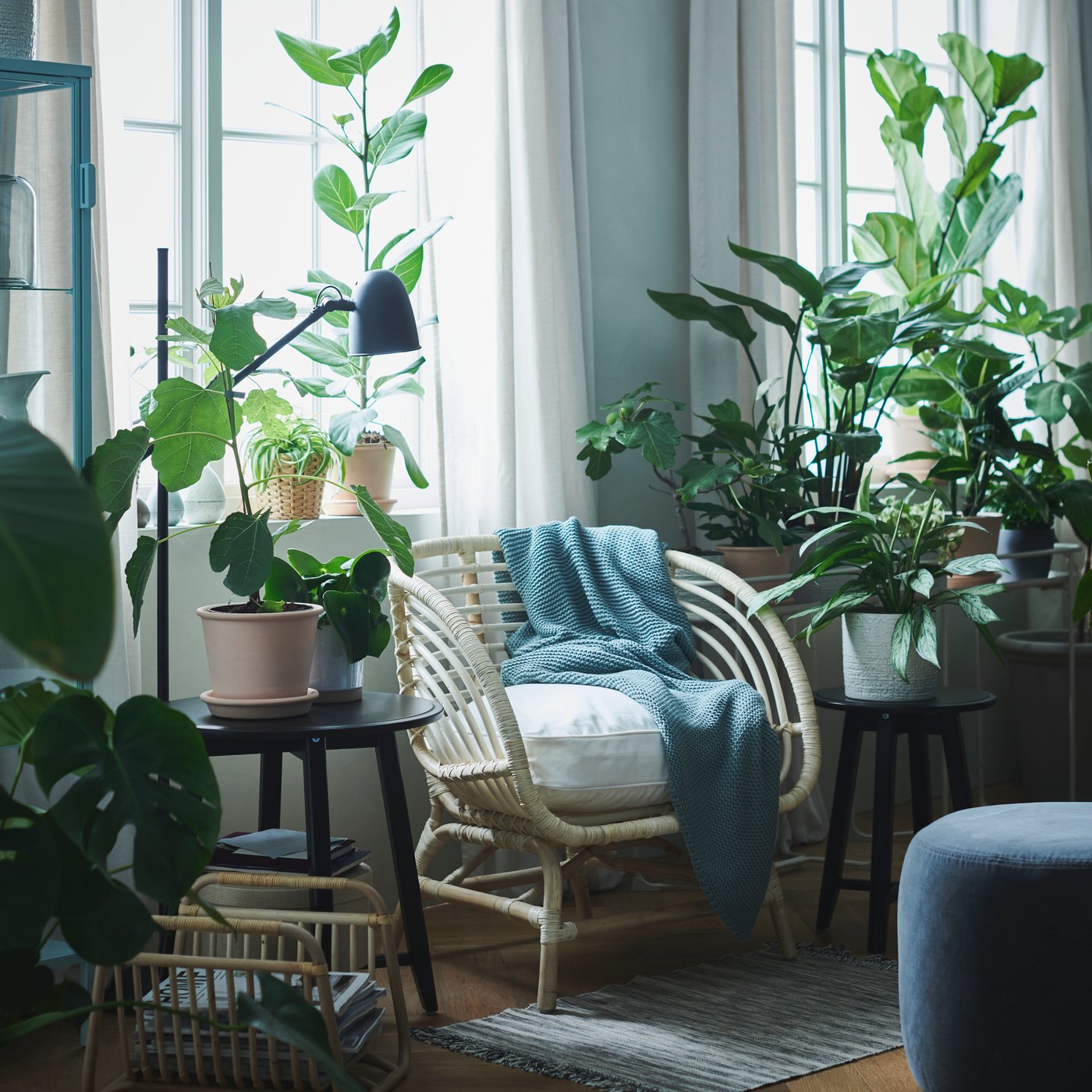 A black SKURUP floor/reading lamp in the living room