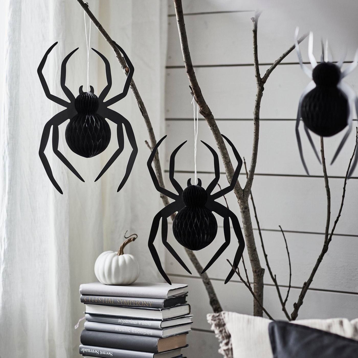 A spider black KUSTFYR hanging decoration