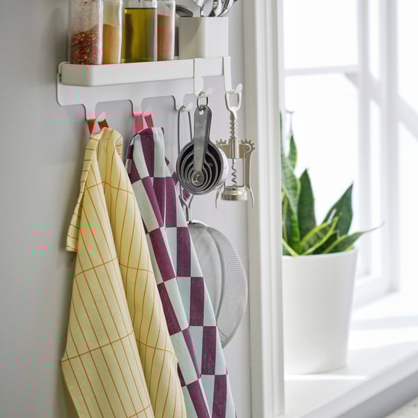 A multicolour/patterned SPJUTLILJA tea towel