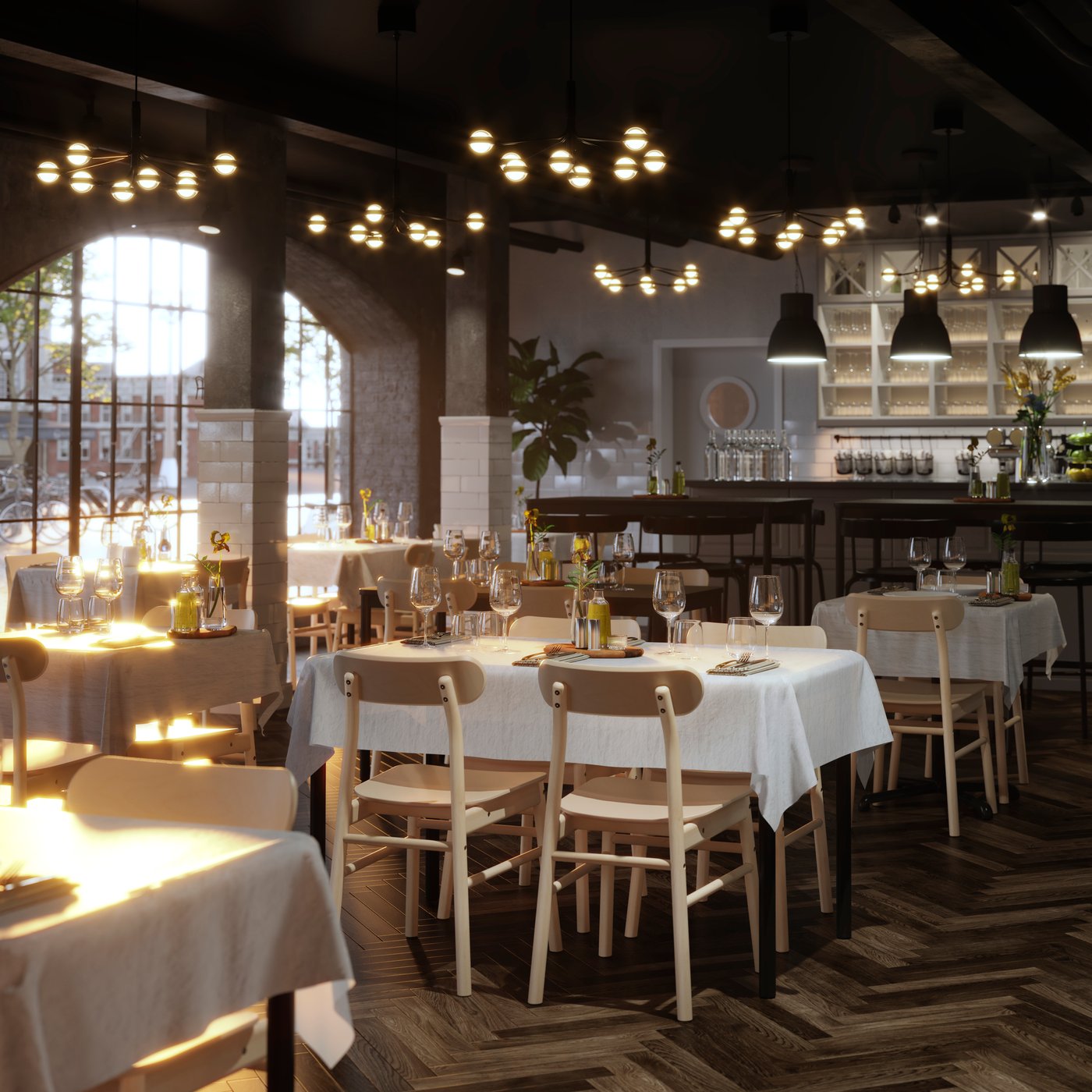 Several well-laid TOMMARYD tables with white table cloths, clear glasses and flowers in a spacious restaurant.