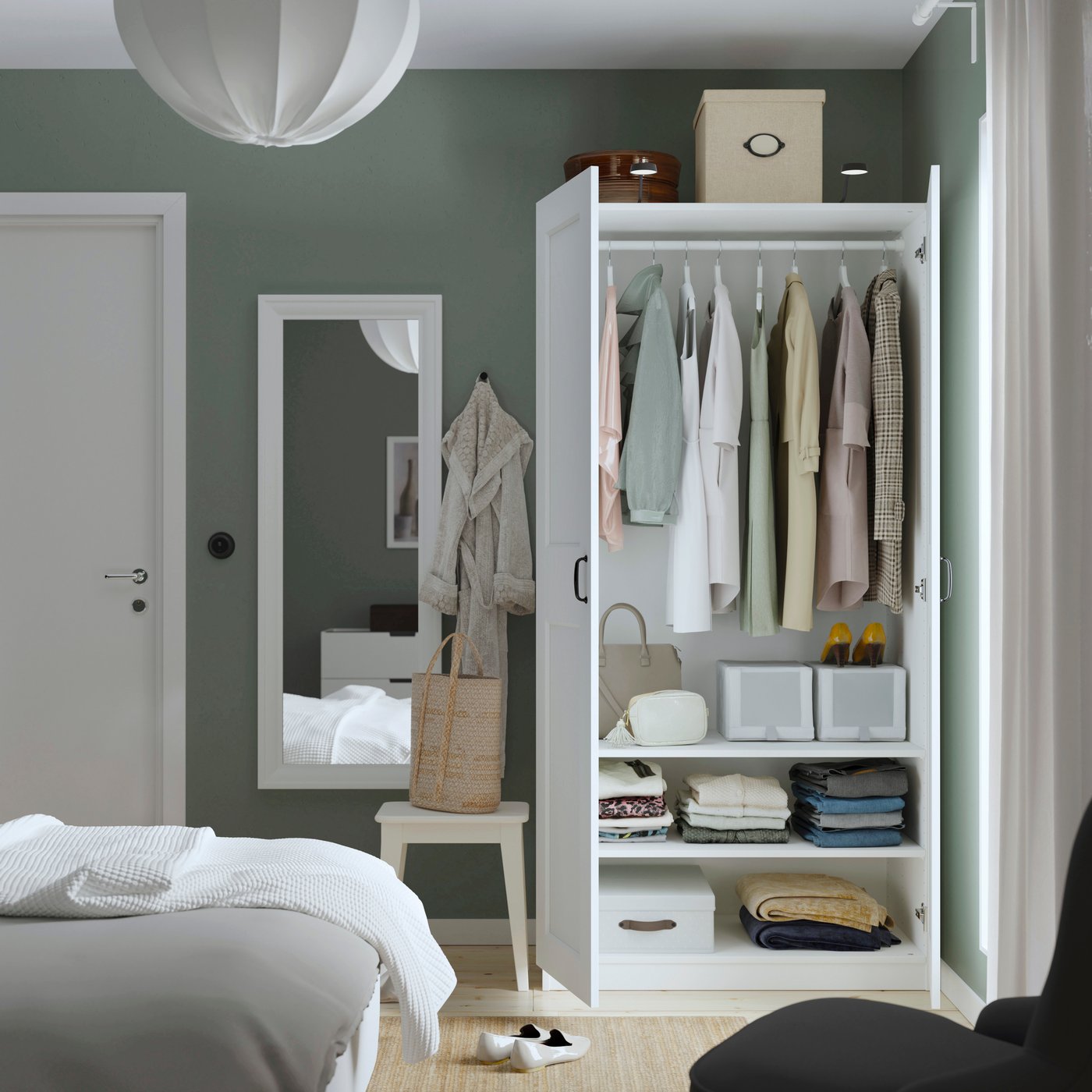 A white/white PAX wardrobe in the bedroom