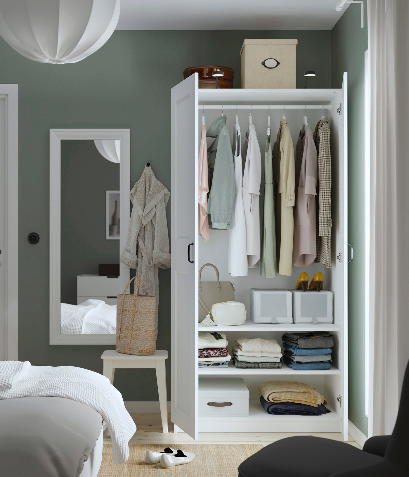 A white/white PAX wardrobe in the bedroom