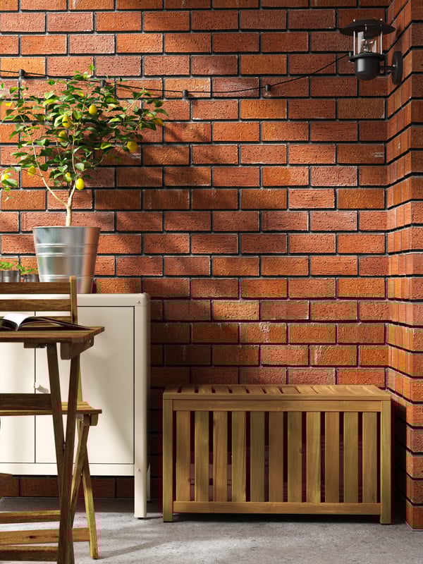 A light brown stained indoor /outdoor NÄMMARÖ storage box