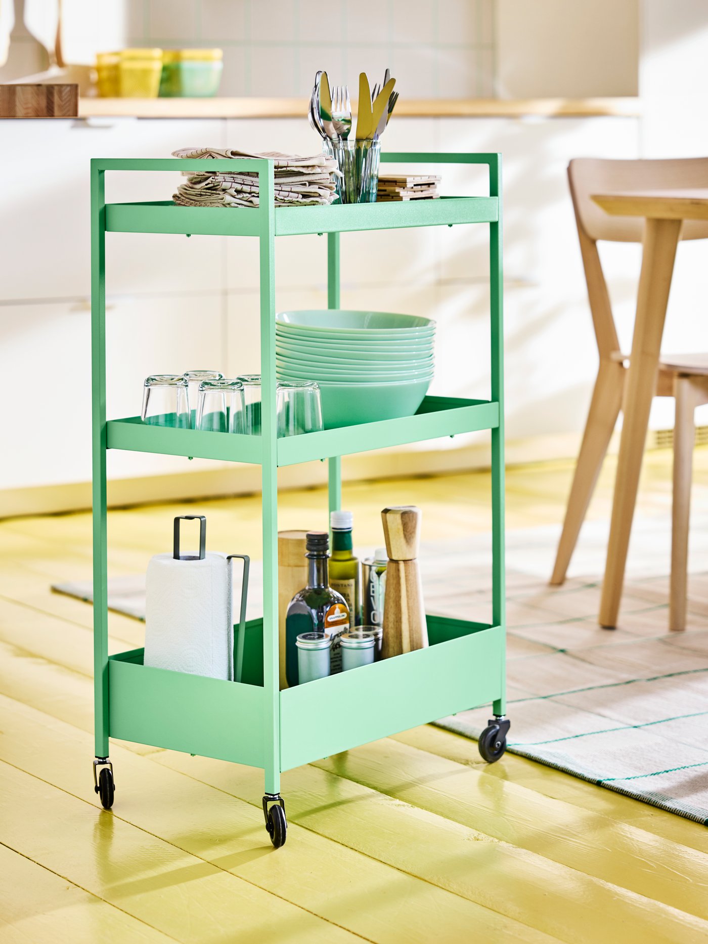 A light green OFTAST serving bowl