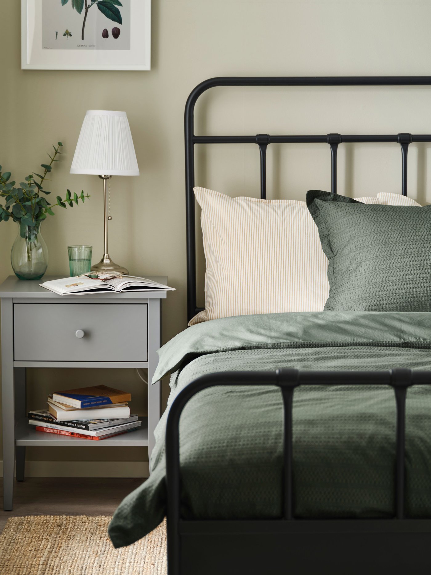 An anthracite STJÄRNÖ bed frame in the bedroom