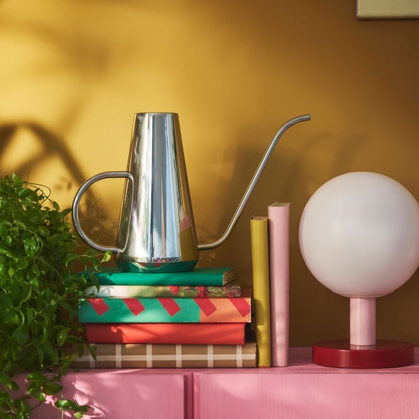 A stainless steel DOFTRIPS watering can