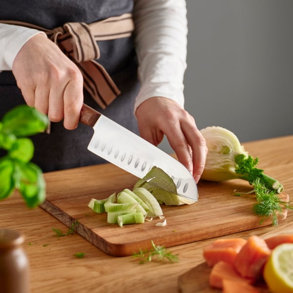 A stainless steel/walnut VARDAGEN santoku knife