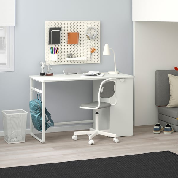 A white LÄRANDE desk with pull-out storage unit
