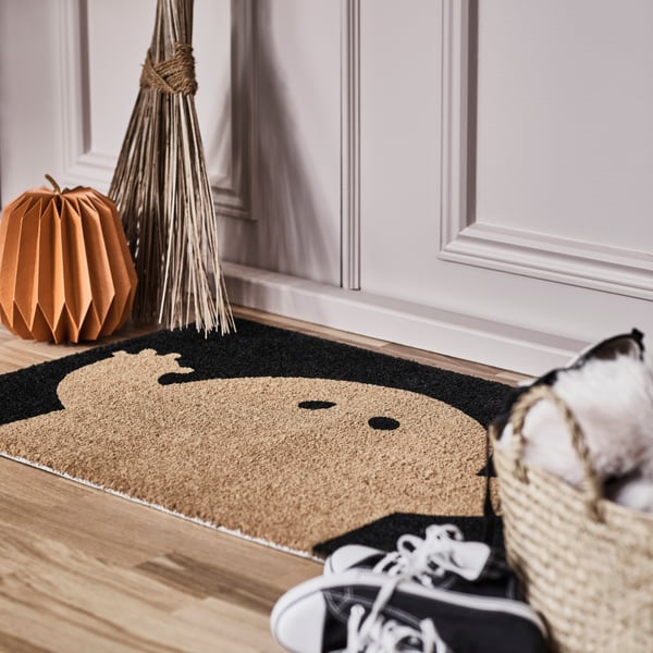 A ghost pattern black/natural KUSTFYR door mat