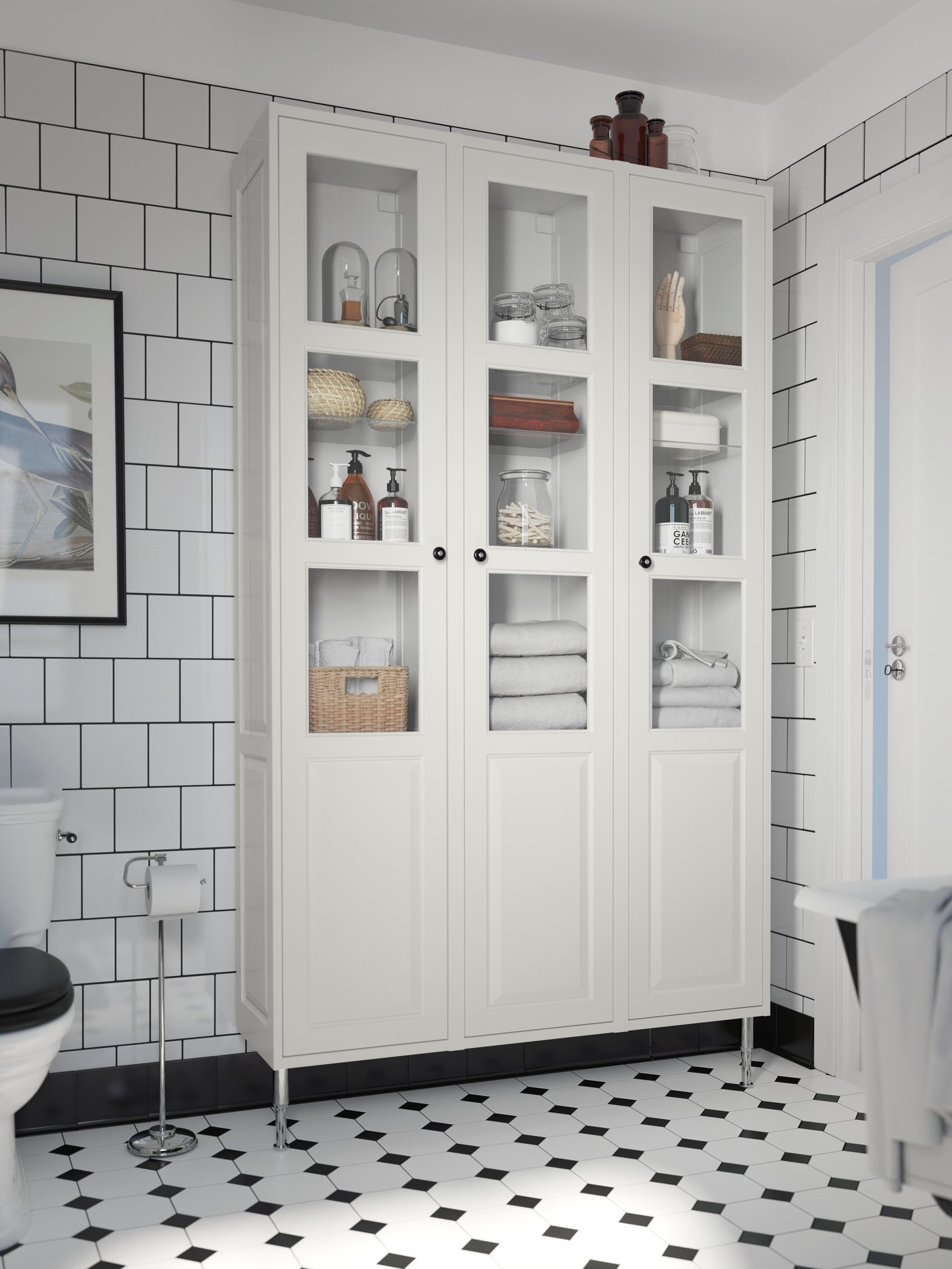 A chrome-plated BALUNGEN toilet roll holder in the bathroom