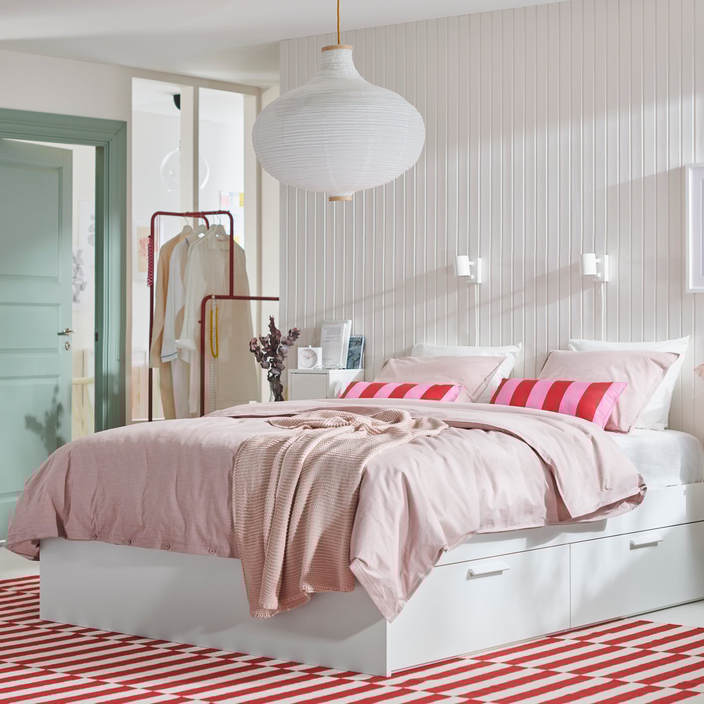 A bedroom with white BRIMNES series.