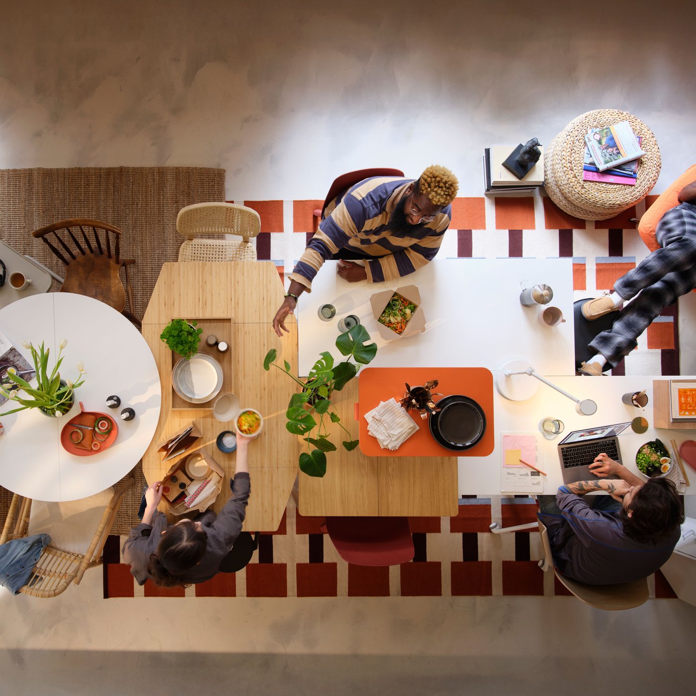A red ODGER chair in the dining room