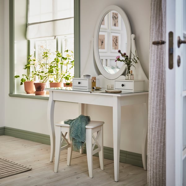 A white HEMNES dressing table with mirror